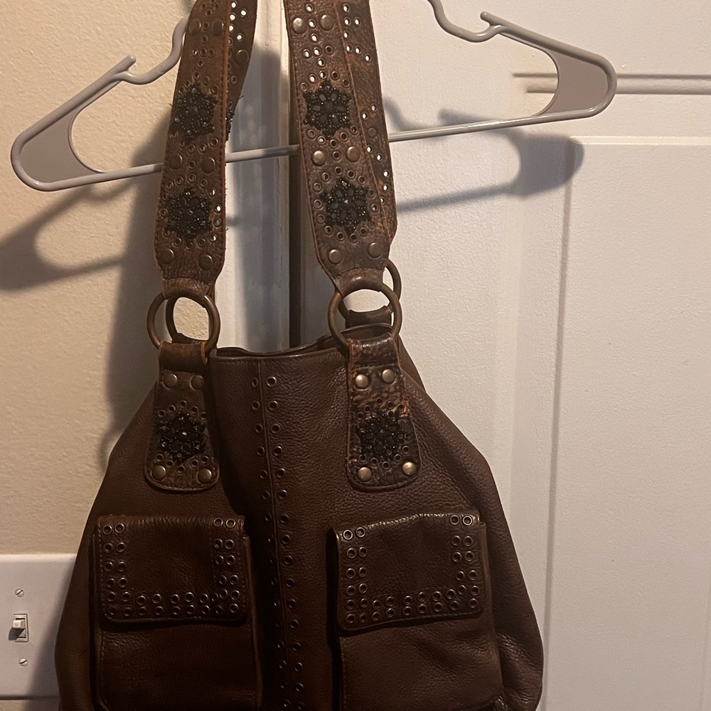 Betsy Johnson Brown Hobo. Black flowered interior